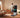 Man using AEKE smart fitness mirror for arms strength training at home