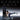Woman performing leg exercise on AEKE Smart Home Gym K1 with workout type icons above.